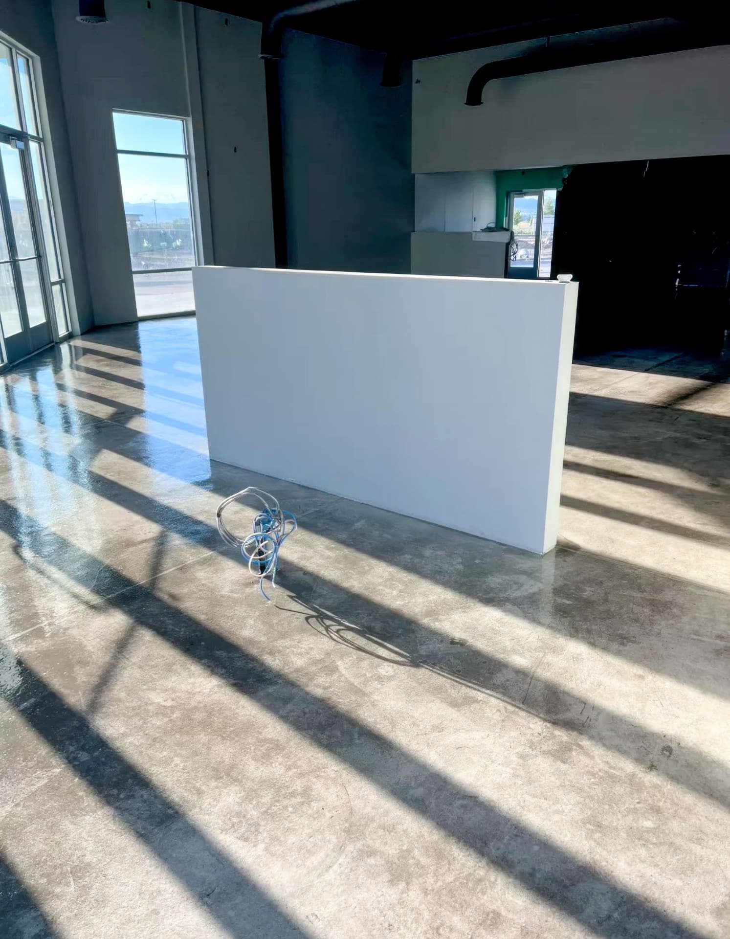 Polished concrete floor in a bright commercial space in Utah.
